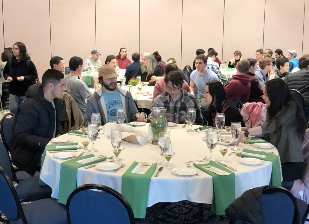 Room filled with tables of guests