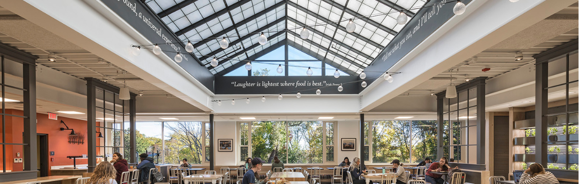 a bright and inviting dining hall with large windows