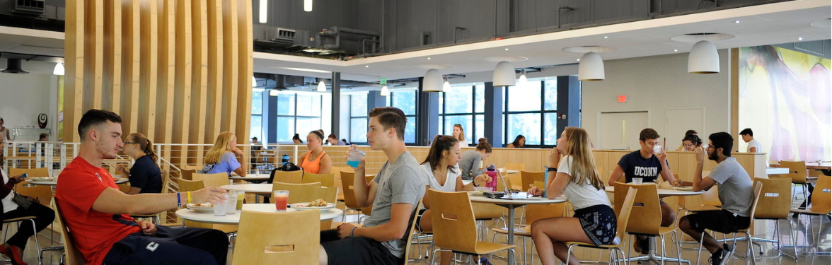 students eating in a dining hall