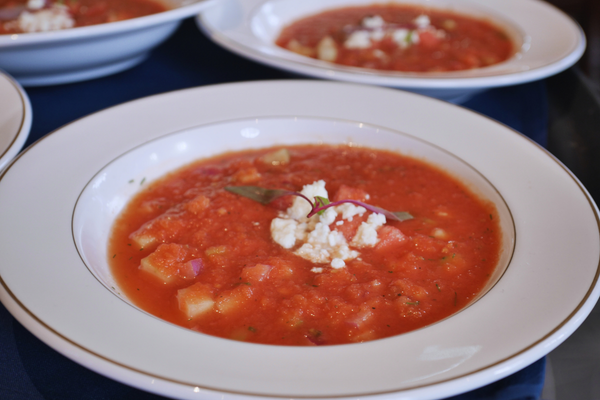 red stew in a white bowl